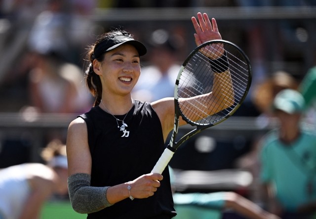 伍兹通过精 伍兹通过精